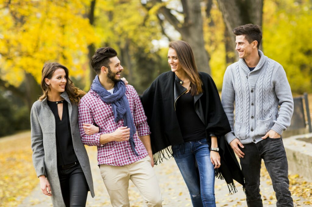 Young people in the autumn park