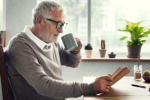 Reading Relaxation Pension Grandfather Coffee Concept